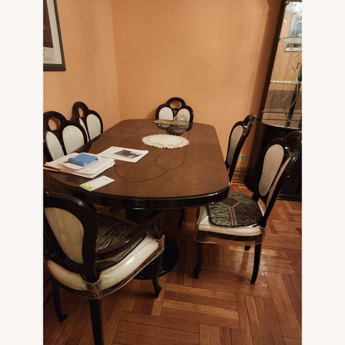 Used  Dining Room Chairs and a Table made in Italy for sale on AptDeco