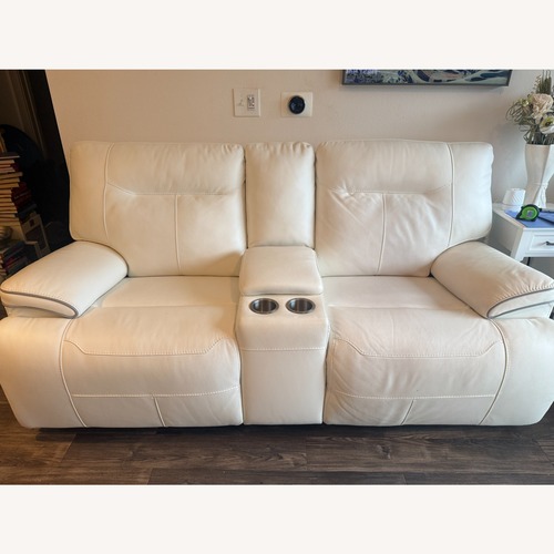 Used Cindy Crawford Home White Leather Loveseat for sale on AptDeco