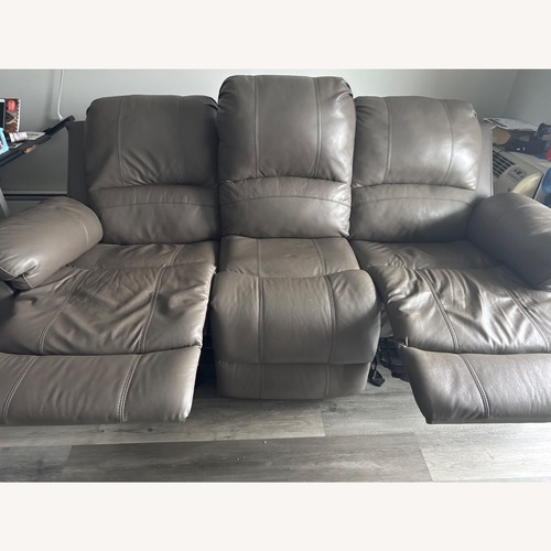 Used Storm Gray Leather 85'' Manual Gliding Sofa for sale on AptDeco