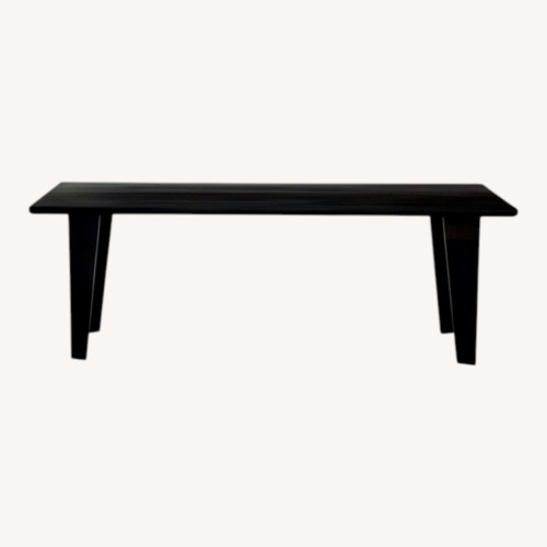 Used Four Hands Black Wood Dining Table for sale on AptDeco