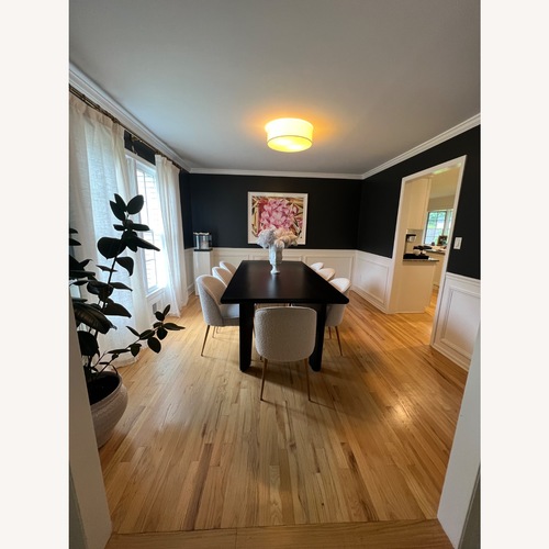 Used Four Hands Black Wood Dining Table for sale on AptDeco