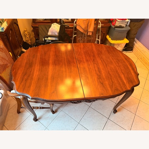 Used Dark Brown Dining Table for sale on AptDeco