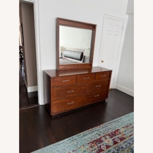 Used Casana Furniture Company Dark Brown Wood Dresser for sale on AptDeco