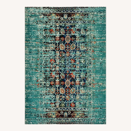 Used Safavieh Monaco Blue Resin Area Rug 9' x 12' for sale on AptDeco