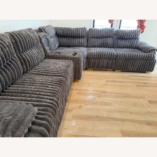 Used Grey Plush Sectional With Charging and Bluetooth  for sale on AptDeco