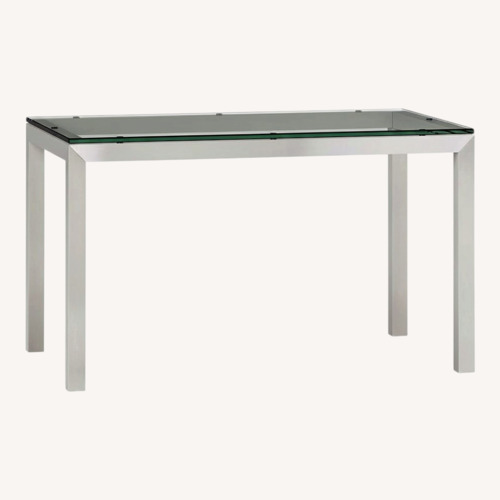 Used Crate & Barrel Parsons Glass Dining Table for sale on AptDeco