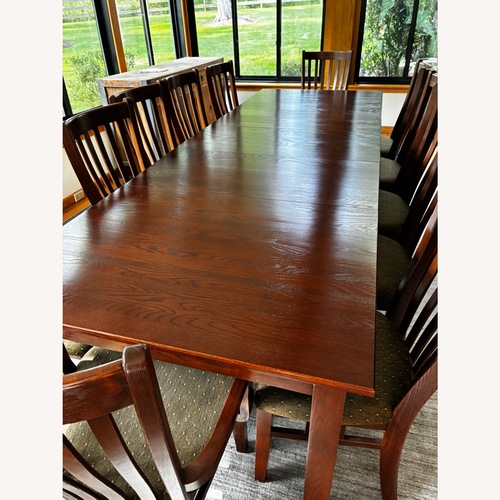 Used Canadel 16 Seat Oak Dining Table and Chairs for sale on AptDeco