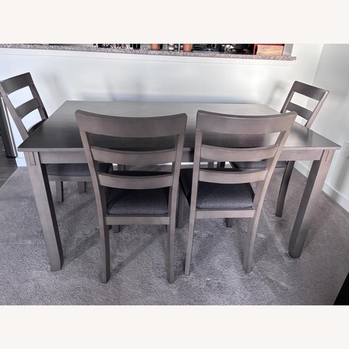 Used Ashley Furniture Dark Gray Wood Dining Set for sale on AptDeco