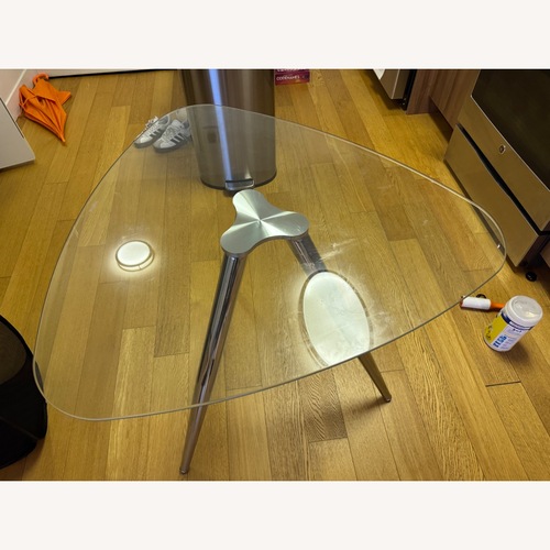 Used Amazon Transparent Glass Dining Table for sale on AptDeco