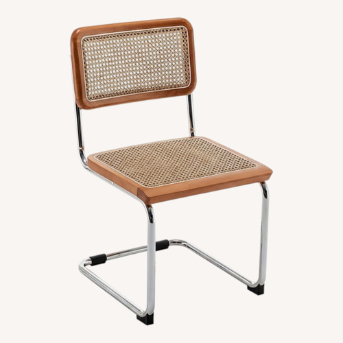 Used Amazon Natural Rattan Dining Chairs for sale on AptDeco