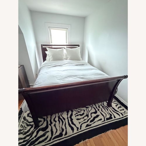 Used Crate & Barrel Giselle Queen Solid Wood Sleigh Bed for sale on AptDeco