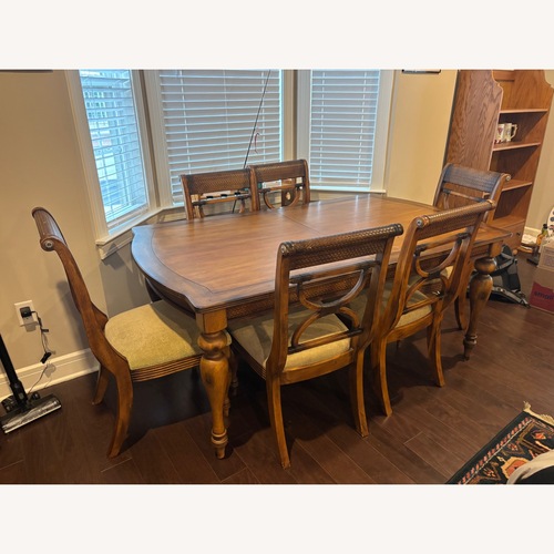 Used Solid Wood Dining Table for sale on AptDeco