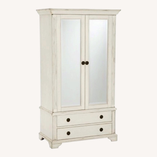 Used Pottery Barn Sofia Mirrored Armoire for sale on AptDeco