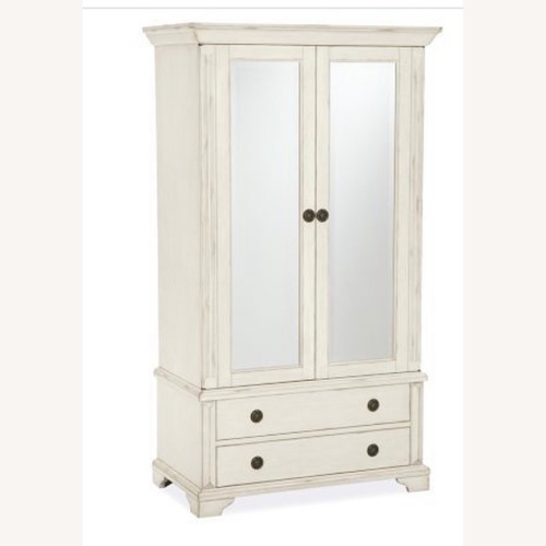 Used Pottery Barn Sofia Mirrored Armoire for sale on AptDeco