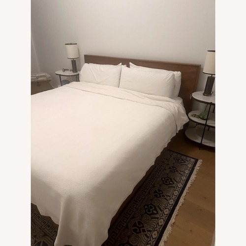 Used Crate & Barrel Dark Brown Wood King Bed for sale on AptDeco