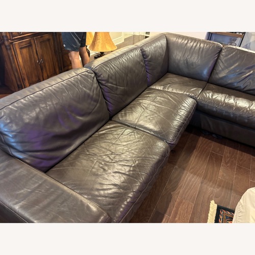 Used Leather 2 Piece Sectional for sale on AptDeco