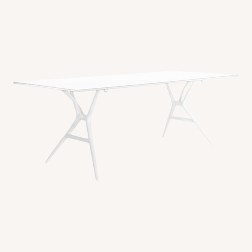 Used Kartell White Dining Table for sale on AptDeco