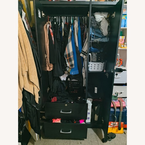 Used Black Wood Armoire for sale on AptDeco