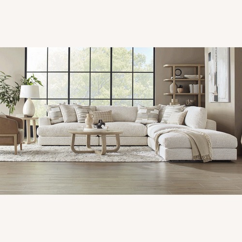 Used Rooms To Go Montecito White Fabric 3+ Piece Sectional for sale on AptDeco