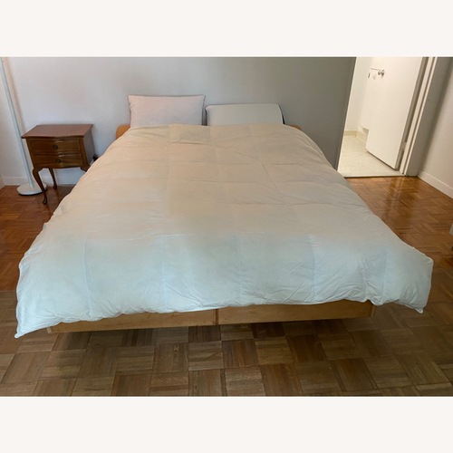 Used Wood Queen Bed for sale on AptDeco