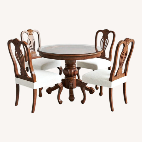 Used Round Glass-top Dining Table With 4 Chairs for sale on AptDeco