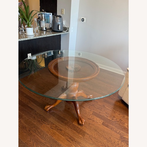 Used Round Glass-top Dining Table With 4 Chairs for sale on AptDeco