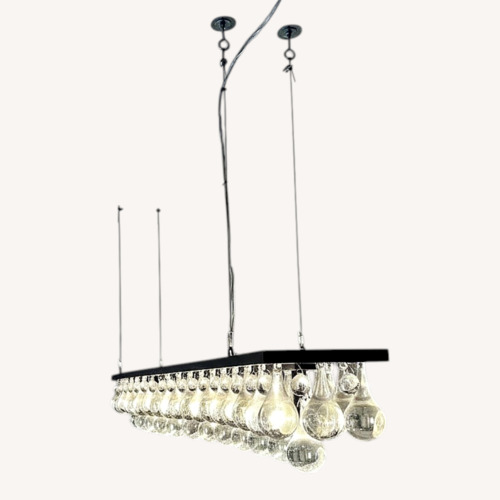 Used Chandelier with Cascading Clear Glass Drops for sale on AptDeco