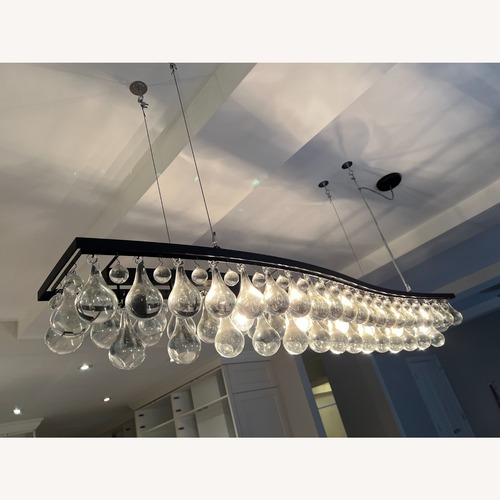 Used Chandelier with Cascading Clear Glass Drops for sale on AptDeco