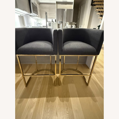 Used Amazon Charcoal & Gold Base 24″ 2 Counter Stools for sale on AptDeco