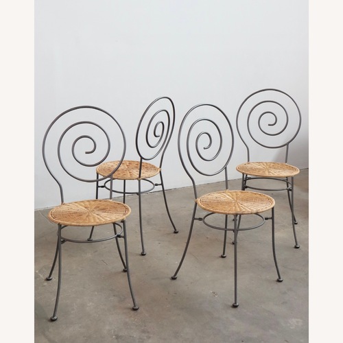 Used Mid-Century Spiral Iron and Wicker Chairs for sale on AptDeco