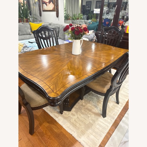 Used Vintage/Antique Finds Dark Brown Dining Table for sale on AptDeco