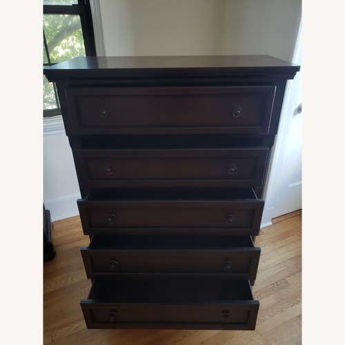 Used Raymour & Flanigan Dark Brown Wood Armoire for sale on AptDeco