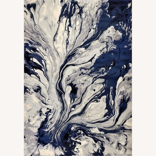 Used Blue, White & Grey Marble Patterned Area Rug for sale on AptDeco