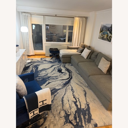 Used Blue, White & Grey Marble Patterned Area Rug for sale on AptDeco