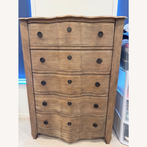 Used Raymour & Flanigan Light Brown Wood Dresser for sale on AptDeco