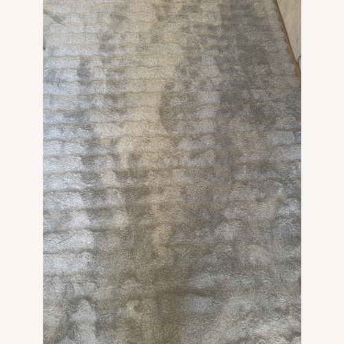 Used Living Spaces Light Gray Area Rug 1' x 7' for sale on AptDeco