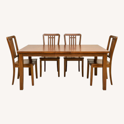 Used Dark Brown Wood Dining Set for sale on AptDeco