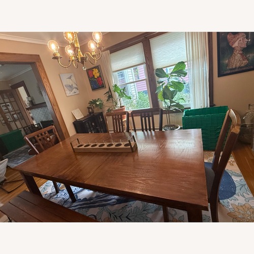Used Dark Brown Wood Dining Set for sale on AptDeco