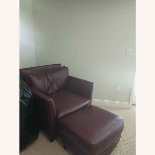 Used Red Leather Armchair with ottoman for sale on AptDeco