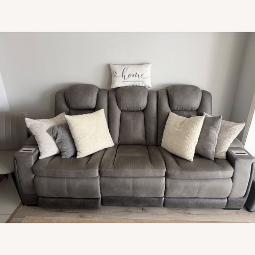 Used Ashley Furniture Dark Gray Leather 3+ Seater Sofa for sale on AptDeco