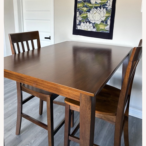 Used Raymour & Flanigan Dark Brown Wood Dining Table Set for sale on AptDeco