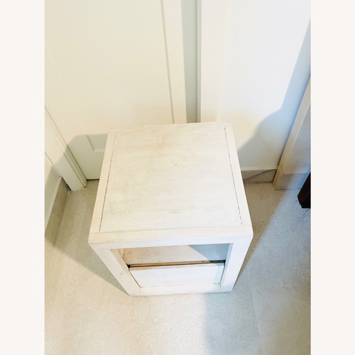 Used Pottery Barn Cayman White Wood Nightstand for sale on AptDeco