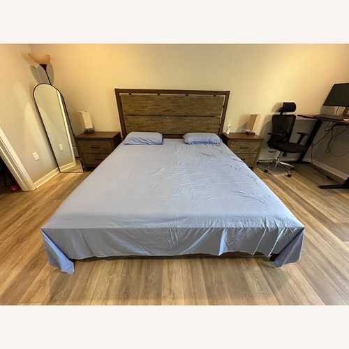 Used Raymour & Flanigan Larkspur King Panel Bed for sale on AptDeco