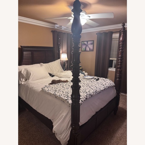 Used Ashley Furniture Key Town Poster Canopy Bed for sale on AptDeco