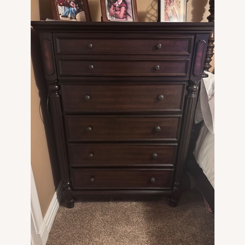 Used Ashley Furniture Key Town Dark Brown Wood Dresser for sale on AptDeco