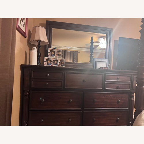 Used Ashley Furniture Key Town Dresser with Mirror for sale on AptDeco