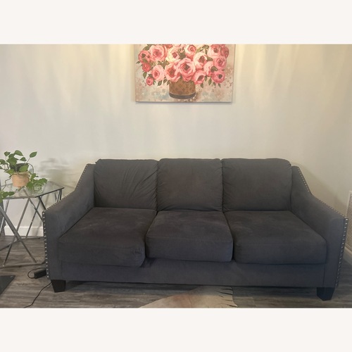 Used Ashley Furniture Smokey Gray Sofa for sale on AptDeco