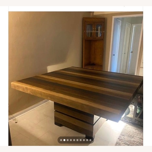 Used Wood Brown Toned Table for sale on AptDeco