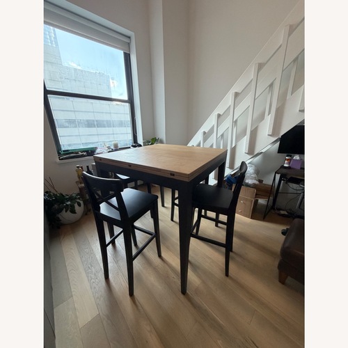 Used Arhaus Cortana Expandable Dining Table - Seats 8+ for sale on AptDeco