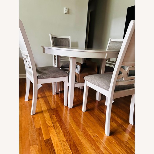 Used Erinberg Dining Table and 4 Chairs (Set of 5) for sale on AptDeco